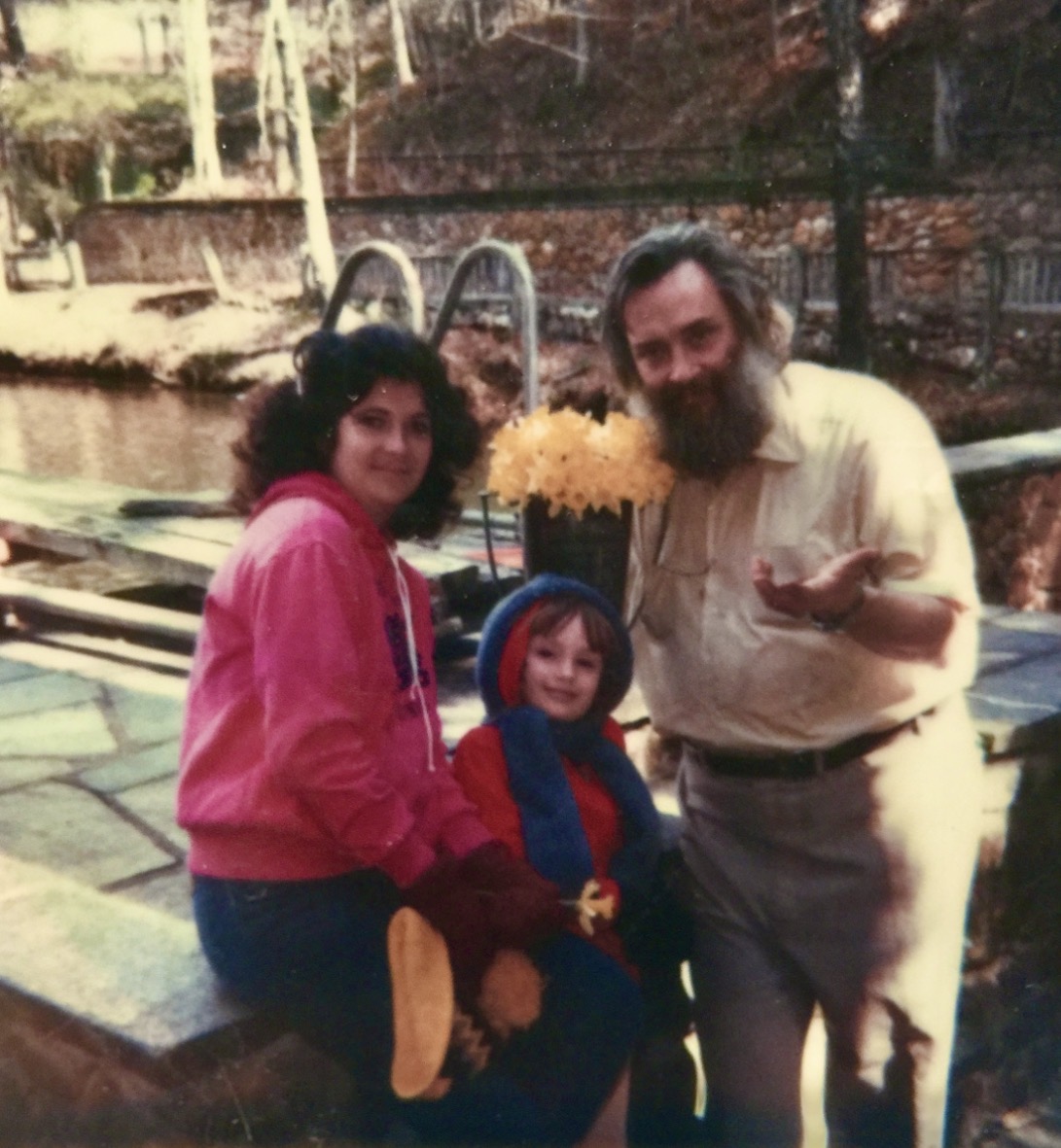 Susan Reynolds Barkocy and Kathryn Reynolds beside the dam at Long Creek Lodge with William Neil Reynolds in 1982